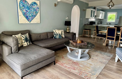 Callendar Condo | 2/Bed Condo, w/AC, Pools, Rooftop patio, 5 Min to Beach, in a gated community.