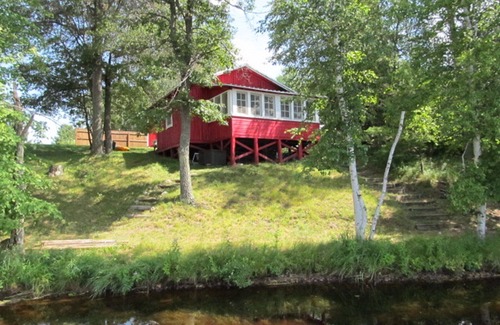 Spooner Cottage | 2 bedroom, 1 bath cabin with bunkhouse on fully recreational lake