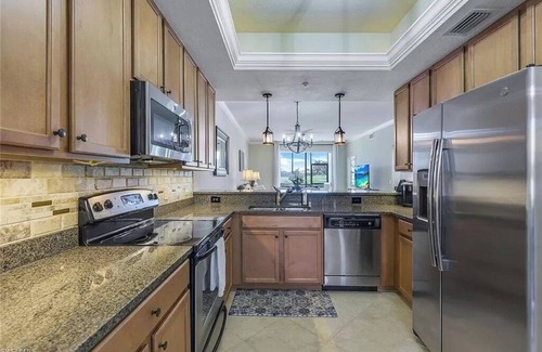 Naples Condo | 2 bedroom/2 bath + Den in Heritage Bay. includes 27 holes of Golf!n
