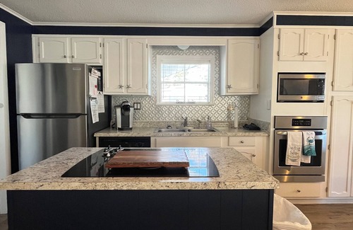 Garden City House | 2 bedroom 2 bath family vacation home comes with golf cart