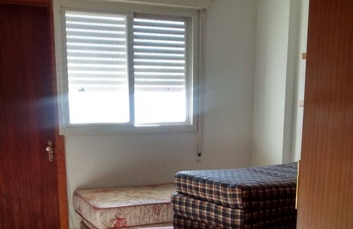 Aparecida Apartment | 2 bedroom apartment facing the beach with balcony with shopping mall/aquarium/restaurants.
