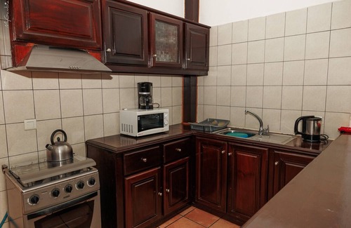 Kololi Apartment | 2 Bedroom Apartments | kitchen | Free Wifi | Daily Cleaning | AC | Cable | Pool