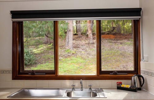 Margaret River Ski Chalet | 2 Bedroom Chalet offers 2 separate bedrooms with a large living/dining area and balcony.