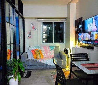 CSJDM Apartment | 2 BEDROOM CONDO close to SM Tungko BULACAN ideal for Family Queen bed on Bedroom 1 accessible to Bedroom 2 with sliding doors Free Wifi & Netflix to watch in a comfy sofa & twin bed Access to SWIMMING POOL entry is very affordable and kids get for free