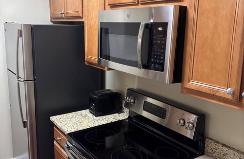 Lackey Condo | 2-bedroom condo in charming Williamsburg with AC, fitness room