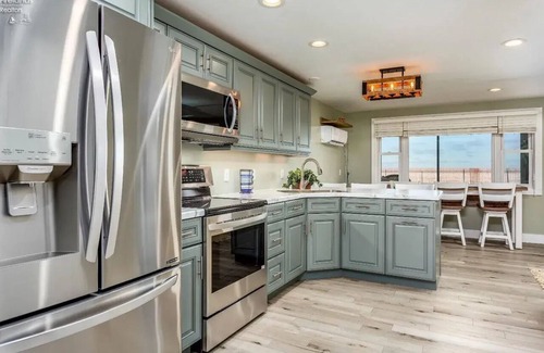 Gypsum Condo | 2-bedroom condo steps away from beautiful Gem Beach