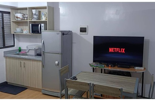 Imus Condo | 2-Bedroom Condo w/Unli Wifi, Netflix, Prime Video, Apple TV, Game Console, Pool
