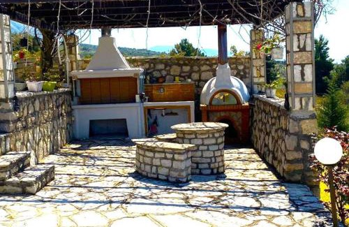 Paleros Villa | 2 bedroom Palm Retreat sea & mountain view