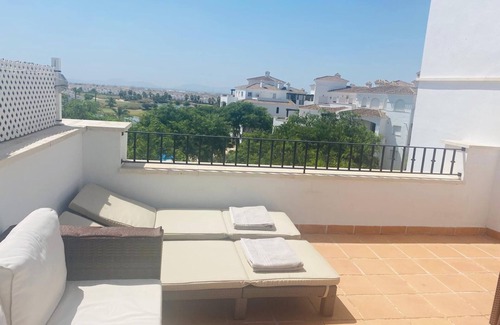 Roldan Apartment | 2 bedroom Penthouse apartment overlooking pool, lake and golf course.