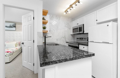 Upper Village Condo | 2 Bedroom, Ski In Out, Heated Pool & 3 Hot Tubs at The Aspens!