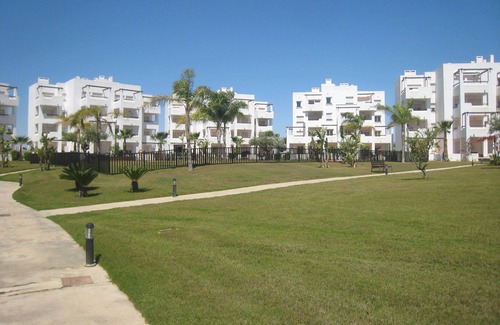 Roldan Apartment | 2 Bedroom (sleeps 4/5) ground-floor apartment backing onto grass area & pool