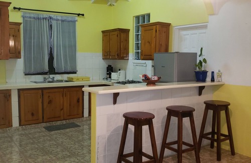 Colihaut Apartment | 2 bedroom, village lifestyle, beachfront home