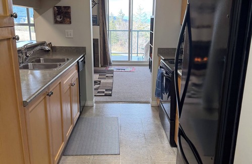 East Kootenay Condo | 2 Bedrooms & 2 Bathrooms | End Unit | Great West Facing View | Hot Tub and Pool