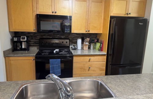 East Kootenay Condo | 2 Bedrooms & 2 Bathrooms | End Unit | Great West Facing View | Hot Tub and Pool