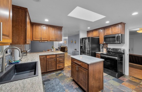 Southeast Bend Condo | 2 Bedrooms, Private Hot Tub, Media Room, Dog friendly with Yard Space.