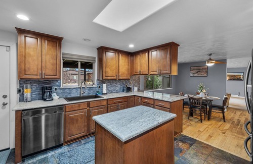Southeast Bend Condo | 2 Bedrooms, Private Hot Tub, Media Room, Dog friendly with Yard Space.