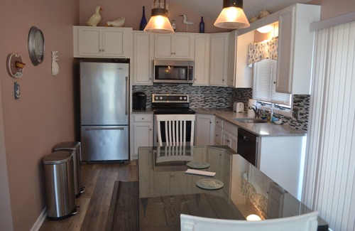 Stone Harbor House | 2 blocks to the beach, short walk to downtown shopping, restaurant and entertainment, 1/2 block to the municipal fishing pier which is well maintained and lit for nighttime fishing. Large Deck, Cleaning Included. 4 off street parking spaces.