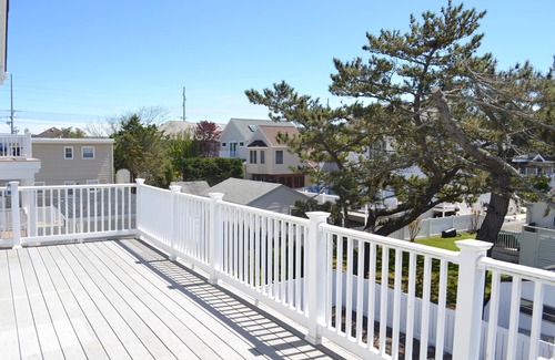 Stone Harbor House | 2 blocks to the beach, short walk to downtown shopping, restaurant and entertainment, 1/2 block to the municipal fishing pier which is well maintained and lit for nighttime fishing. Large Deck, Cleaning Included. 4 off street parking spaces.