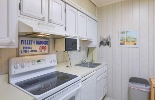 North Ocean City Villa | 2 BR 2 BA Ocean Front Condo with side view of Ocean Pool, Elevator, Tennis