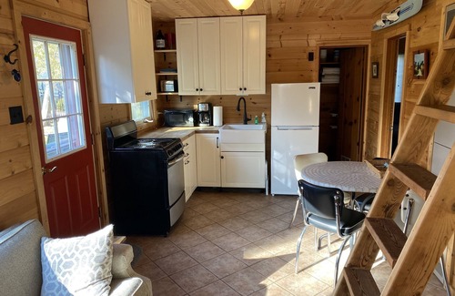 Beulah Cabin | 2 BR Crystal Lake cabin. Private beach, easy Ice Fishing Near Crystal Mtn