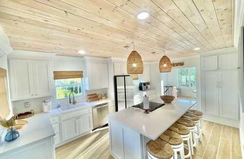 Treasure Cay House | 2 master suites w/2 separate living spaces w/pool & private beach access