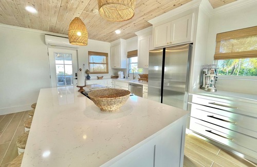 Treasure Cay House | 2 master suites w/2 separate living spaces w/pool & private beach access