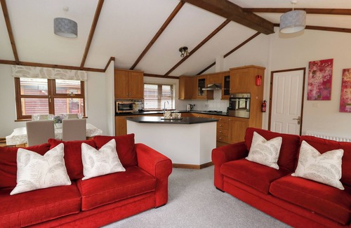Boncath Cottage | 2 RIVERSIDE LODGE, family friendly, with hot tub in Cenarth