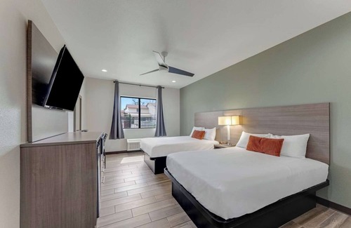Eastside Promise Neighborhood Hotel | 2 Spacious Room w/Complimentary Breakfast Ideal for Group Business Trip