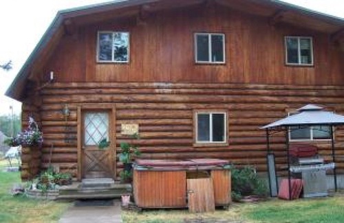 Condon House | 2 Story Log Home, on a Swan River near Mission Mountain Wilderness Views