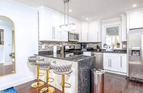 North Michigan Park House | 2 Story Oasis: 30+Days + Large Yard/Pet Friendly