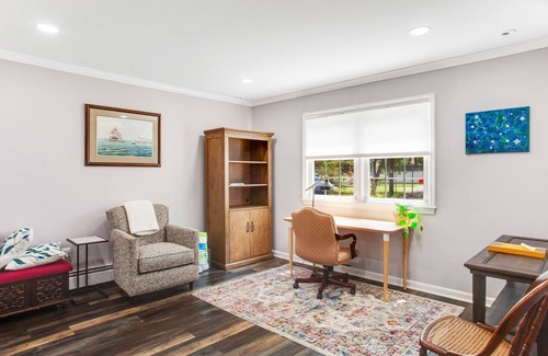 Edgewater House | 2-story, riverfront home with private dock, inviting deck & dog-friendly yard