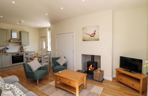 Cornhill on Tweed Cottage | 2 TWIZEL STATION COTTAGE, pet friendly, with open fire in Norham
