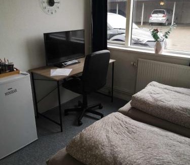 Kolding House | 2 værelser m minikøkken brusekabine og toilet 4 prs