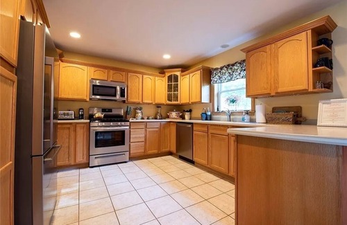 Town of Aurelius House | 200' of private waterfront, hot tub & kayaks
