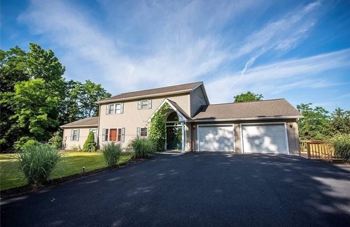 Town of Aurelius House | 200' of private waterfront, hot tub & kayaks