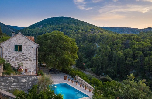 Dol House | 200 year old Mediterranean stone house recommended by The Sunday Times