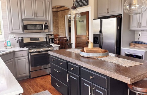 Fairwood House | 2000sf Decks, Waterfall, Hot Tub, Gym, Newly Remodeled Kitchen, Movie/Game room