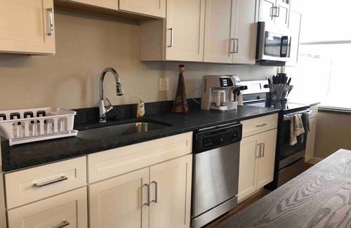 Charleston Apartment | 202 Brand new Downtown living - king - WiFi 70” TV