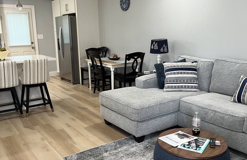 Silver Sands Beach Condo | 2022 Renovation! Surf side and stones throw from the beach!