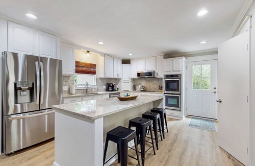 Gainesville House | 2025 Fully Renovated lakefront home with two-story dock, WiFi, & game room