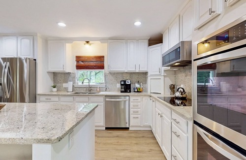 Gainesville House | 2025 Fully Renovated lakefront home with two-story dock, WiFi, & game room