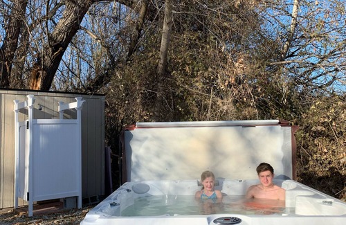 Eagle House | 23 Acre Riverfront bunkhouse “Glamping” glamorous camping in the city of Eagle!