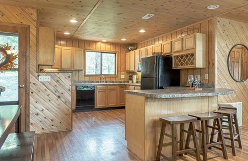 Innsbrook Ski Chalet | 2621 Grendel Grove, Gorgeous Lakeside Chalet with Yard, Firepit, Private Dock By Sarah Bernard