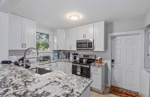 Riverside House | 2694- Single Level Riverside Home, Sleeps 10, Fenced Yard, Pet & Family Friendly