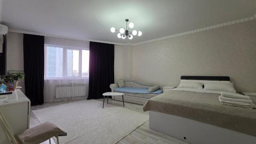 Nur-Sultan Apartment | 27 ТОП ЛОКАЦИЯ,центр,возле Байтерка,1 комн кв на 1-4х гостей, шикарный матрас, диван ортопедический