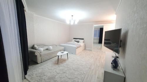 Nur-Sultan Apartment | 27 ТОП ЛОКАЦИЯ,центр,возле Байтерка,1 комн кв на 1-4х гостей, шикарный матрас, диван ортопедический