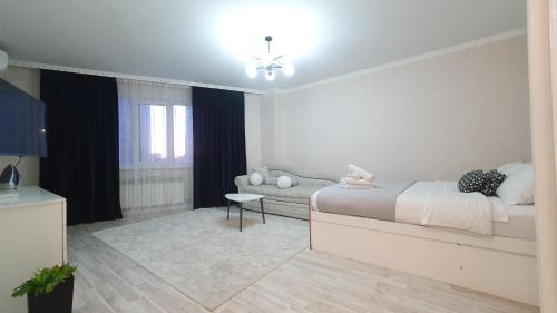 Nur-Sultan Apartment | 27 ТОП ЛОКАЦИЯ,центр,возле Байтерка,1 комн кв на 1-4х гостей, шикарный матрас, диван ортопедический