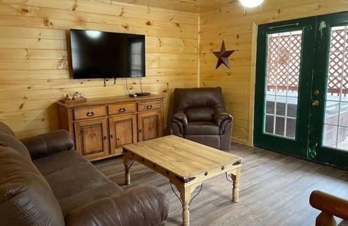 Lejunior Cabin | 2BR 1 Bath cabin w/full kitchen, hot tub, and living room.
