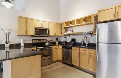 Strip District Apartment | 2BR 2BA Historic Loft Retreat With Pool