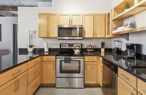 Strip District Apartment | 2BR 2BA Historic Loft Retreat With Pool